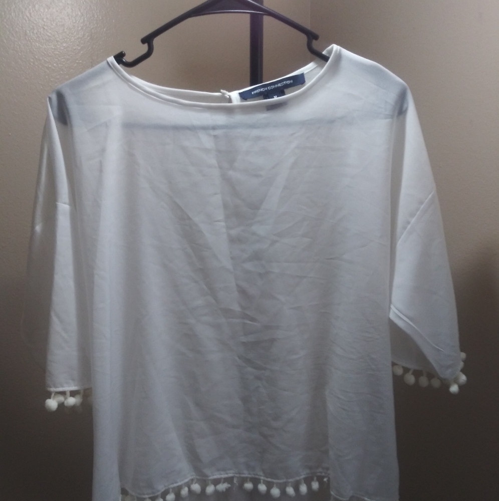 White pom pom blouse